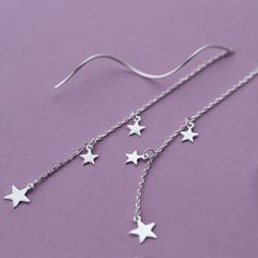 These cute dangle drop star threader earrings features long waving ear line and cute tiny stars charm on cable chain, made of solid 925 sterling silver that will shine for a long time. Add these cute stars threader earrings long dangle drop ear lines to your everyday fine jewelry collection or as gift for your love one. Material: 925 sterling silverFinish: platinum plate Jewelry Care: See more information about how to care for your jewelry here. Shipping Policy: Orders will be shipped within 1-3 Plate Jewelry, Ear Threader, Tiny Star, Cute Stars, For Your Love, Threader Earrings, Earrings Long, Fine Jewelry Collection, Star Charms