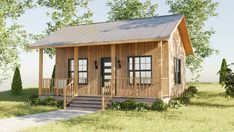 a small wooden cabin sitting on top of a lush green field