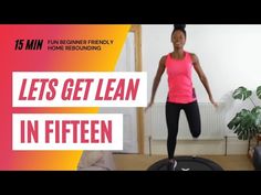 a woman in pink shirt and black leggings standing on a yoga mat with the words let's get lean in fifteen