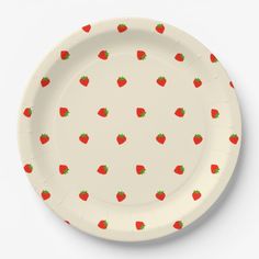 a paper plate with strawberries on it