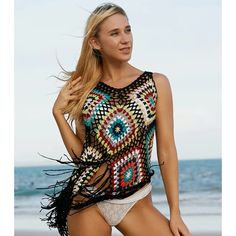 Experience Summer Bliss with our Colorful Crochet Tops Elevate your beach style with our handcrafted Colorful Crochet Tops Tassel Swimsuit Cover Ups. Made from 100% polyester, these vibrant cover-ups are designed to add a touch of bohemian flair to your swimwear collection. Product Features: Crochet tops handmade with love Eye-catching rainbow colors One Size fits most (Bust: 112cm, Length: 60cm without tassel, Tassel Length: 16cm) Sleeveless and breezy design Perfect for holiday beachwear Benefits of our Colorful Crochet Tops: Enhances your beach ensemble with a pop of color Provides coverage while keeping you cool Handmade quality ensures uniqueness Easy to pack and ideal for travel Versatile piece that can be worn over swimsuits or as a standalone top Size Chart: Size Bust Length Tassel Bohemian Sleeveless Beach Cover-up Swimwear, Bohemian Multicolor Tassel Cover-up, Bohemian Multicolor Sleeveless Swimwear, Bohemian Multicolor Swimwear, Bohemian Multicolor Swimwear For Beach Season, Multicolor Sleeveless Cover-up For Beach Season, Bohemian Multicolor Swimwear For Vacation, Bohemian Beach Cover-up Swimwear For Vacation, Bohemian Swimwear For Vacation Beach Cover-up