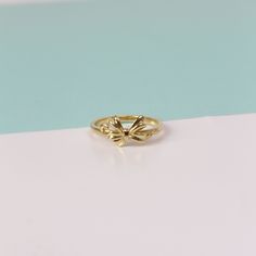 14k Gold Ribbon Ring | Genuine Solid Gold Ring | Ribbon Shape Gift For Her ➤ Ring Details * 14k / 18k Yellow Gold or Yellow Sterling Silver * Gold Color Options; 14K / 18k White, Yellow, Rose Gold * Sterling Silver Color Options; Yellow, Rose, White * Top Width: 9 mm * Top Length: 9 mm * Band Width: 1.90 mm * Band Thickness: 1.45 mm * Ready to Ship 3-5 Business Days 💍 ISEA Jewels' pieces are handcrafted by 10-15 years of experienced craftsmen and made to order in a very short time. 🎁 All piece 14k Yellow Gold Stackable Rings As Gift, Gold Sterling Silver Butterfly Ring For Anniversary, Gold 14k Birthstone Ring As Gift, Yellow Gold Round Band Ring Gift, 14k Gold Rings For Gifts, Gold Butterfly Ring For Anniversary, Yellow Gold Butterfly Ring For Anniversary, Dainty Yellow Gold Ring For Gift, Dainty Yellow Gold Rings Perfect For Gifts