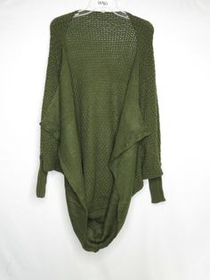 NWOT UNBRANDED ONLINE ITEM GREEN DOLMAN SLEEVE OPEN FRONT CARDIGAN ONE SZ #H980 Shipping: Calculated Important Details Pictures are taken in the best light possible. Please note that we do our best to represent the colors as they appear in person but different lights cause colors to look differently. Also every computer, tablet, and smartphone has different settings that can change the color on your screen. If you are very particular about the color ebay not be for you. Many things are considere Khaki Long Sleeve Sweater For Spring, Fall Green Stretch Cardigan, Green Stretch Sweater Solid Color, Green Stretch Sweater, Relaxed Fit Open Knit Cardigan For Fall, Oversized Green Long Sleeve Sweater, Oversized Solid Color Trendy Sweater, Slouchy Long Sleeve Sweater For Spring, Stretch Open Knit Outerwear For Fall