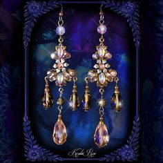 This pair of Handmade Chandelier Earrings is made with bronze Victorian replica stampings decorated with Swarovski rhinestones, Czech glass and brass floral embellishments.  Black Diamond and Blush Pink crystal beads dangle from the design.  Pierced with french wires (as shown), clip-ons, leverbacks or posts, just select from the pull-down menu.   -4" Long x 1 " Wide -0.2 oz. ea. *Comes Ready To Gift in Decorative Packaging *Each Pair is Made Just for You!  Kerala Rose Pinterest page: https://ww Victorian Dangle Chandelier Earrings For Parties, Victorian Chandelier Dangle Earrings For Party, Gold Gothic Earrings For Parties, Victorian Style Party Chandelier Earrings, Ornate Handmade Chandelier Earrings For Party, Handmade Ornate Chandelier Earrings For Parties, Handmade Chandelier, Neo Victorian, Crystal Dangle Earrings