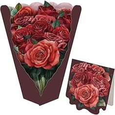 a bouquet of red roses in a vase with two greeting cards on the front and back