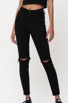 Stylish and edgy, this high rise black skinny jeans feature distressing throughout, rips on both knees and a just the right amount of stretch. Five pockets, belt loops, and zip fly closure. Inseam 28", Rise 11" 94% Cotton, 4% Elasterell, 2% Spandex She Is Clothed, Washed Jeans, High Rise Jeans, Black Skinnies, Sweater Coats, Long Tops, Fashion Boutique, Long Sleeve Sweater, Jumpsuit Romper