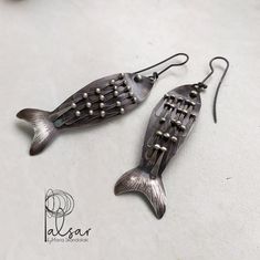 Handmade Fish earrings, so to remember the summer... Oxidized Sterling silver earrings with embossed details ■ Jewelry Design Details: ◘ Material: Sterling Silver 925 + Additional style: » Gold Plated Design / Rose Gold Plated Design / Οxidized Design ◘  Size: 7cm x 1.8cm ▶︎ How to order: Select the color of the plating. ►The primordial forms of handcrafting give shape/structure and intensity to the material. Leaving imprints the creator highlights the uniqueness of her work.◄ ✈ FREE WORLDWIDE D Handmade Fish-shaped Earrings For Gifts, Silver Fish-shaped Earrings With Ear Wire, Handmade Silver Fish-shaped Earrings, Nickel-free Silver Fish-shaped Earrings, Silver Fish-shaped Earrings With Fish Hooks, Silver Sterling Fish-shaped Earrings, Silver Fish-shaped Sterling Silver Earrings, Fish Earrings, 30th Birthday Gift