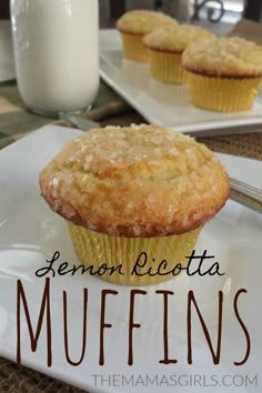 lemon ricotta muffins on a white plate with a glass of milk in the background