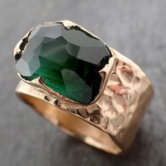 I created this setting in wax then cast it in recycled solid 18k yellow gold at my home studio. My husband partially faceted the gemstone. This ring is a size 7 it can be sized. The stone is a Green tourmaline. it measures about 9.5mm X 14mm I created a rustic texture in the gold. The hand textured wide band is around 11.5 mm. Throughout all time and history, in every tribe and culture all around the world crystals, minerals and gemstones have used for healing, luck, divination, adornment vibrat Rustic Texture, Minimal Jewelry, Minerals And Gemstones, Statement Bracelet, Green Tourmaline, Wide Bands, Crystals Minerals, Home Studio, Store Credit Cards