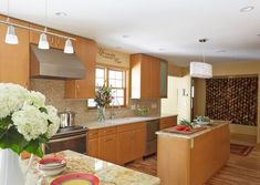 the kitchen is clean and ready to be used as a dining room or family room