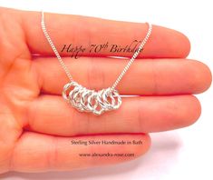 Handmade sterling silver 70th birthday necklace with 7 twisted rings, presented on a personalised backing card.  70th Gift for Nan, Personalised 70th Birthday Gift for Grandma, 70th Gift for Best Friend, 70th Gift for Wife, 70th Gift for Mum, 70th Gift for Sister,750th Gift for Godmother, 70th Gift for Aunt. Beautifully handmade sterling silver necklace with 7 twisted rings, presented on a personalised card.  🎉One ring celebrates each amazing decade!🎉 The necklace is displayed on an optional p Birthday Gifts For 70 Year Old Mother, Women’s 70th Birthday, 70 And Fabulous, Gift For Godmother, Birthday Gift For Grandma, Happy 70 Birthday, Gift For Aunt, Gifts For Nan, Birthday Necklace