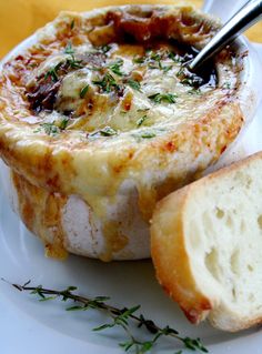 a close up of a plate of food with bread