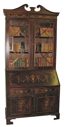 an old bookcase with many books on it