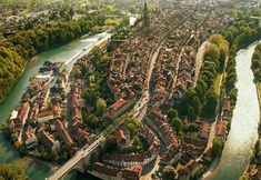 an aerial view of a city and river