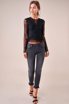 The Temptress is a sheer lace top covered in a floral design. The top features a high neckline, long fitted sleeves, and a darted bodice with a cropped, pleated hem. This ultra-sultry number is perfect for showing off your midriff in jeans and heels. Model is 5'9" and wearing size small. Pre-Order Now! Estimated Shipping Date October 25, 2019. Available in black. 100% polyester. Imported. Sheer Lace Top, Fitted Sleeves, October 25, High Neckline, Sheer Lace, Long Sleeve Lace, Pre Order, Bodice, Lace Top