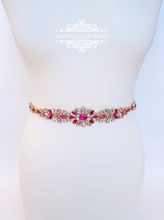 "Fuchsia bridal belt, pink bridal belt, hot pink sash, Bridesmaid sash, Pink bridal sash, bridesmaids sash, dress belt, fuchsia pink belt, sash belt, fuchsia sash belt, pink wedding sash, magenta wedding VERONICA ♥ Stunning beautiful dress embellishment, rhinestone sash on double sided ribbon, ♥ Gold tone setting/ clear/light pink/ fuchsia/ matte rose stones with rosewood tone ribbon. 4 cm/ 1.57\" at centre, 49.5 cm/ 19.5\" long It is displayed on UK 10 /US 8 Size mannequin. (waist 27 inches) ♥T Elegant Fitted Pink Sashes, Elegant Red Wedding Sash, Pink Bridal Belt With Sashes For Party, Elegant Pink Bridal Belt With Sashes, Pink Sashes Bridal Belt For Wedding, Elegant Pink Bridal Belt For Wedding, Magenta Wedding, Jeweled Belts, Pink Sash