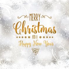 merry christmas and a happy new year card with gold lettering on a blurry background