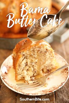 a piece of cake on a plate with a fork sticking out of it and the rest of the cake in the background