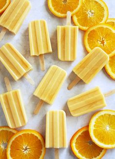 popsicles with orange slices cut in half