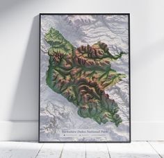 a framed map of scotland on the wall