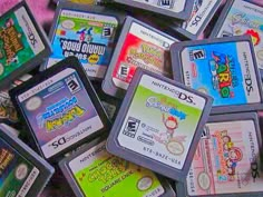 several nintendo gameboy games are stacked on top of each other in this pile together