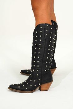 Whether you're strutting down the street or hitting the dance floor, the Broadway Bunny boots are sure to make a statement. The white leather upper is adorned with gleaming studs, creating a look that is both sophisticated and edgy. Foot: Leather Shaft Height: 16" Circumference: 15" Heel Height: 2" Insole: Cushion Comfort Insole Toe Shape: Snip Outsole: Rubber Western Boots With Rhinestone Rivets For Fall, Edgy Studded Faux Leather Boots, Trendy Faux Leather Boots With Rivets, Edgy Spiked Boots For Fall, Fall Party Platform Boots With Studs, Fall Party Studs Platform Boots, Edgy Faux Leather Boots With Rivets, Winter Rivet Faux Leather Boots, Winter Faux Leather Boots With Rivets