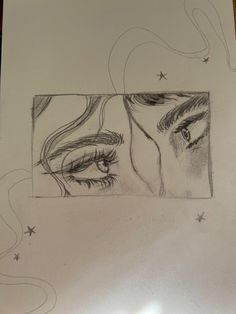 a drawing of two women's eyes with stars in the background