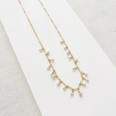 The Fringe Necklace effortlessly blends understated charm with subtle glamour, making it the perfect accessory to elevate spring and summer's open necklines. Timeless freshwater pearls cascade down a delicate chain. Adjustable for effortless style, this necklace is a wearable work of art. - 16 inches in length with a 1-inch extender - all pieces are 14K Gold Filled or Sterling Silver, for more information on our metals click HERE! Fringe Necklace, The Fringe, Freshwater Pearl Necklace, Delicate Chain, Freshwater Pearl Necklaces, Effortless Style, Fresh Water, Freshwater Pearls, Gold Filled