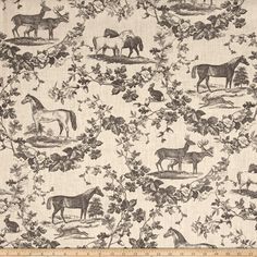 the fabric has horses on it and flowers in black, white, and grey colors