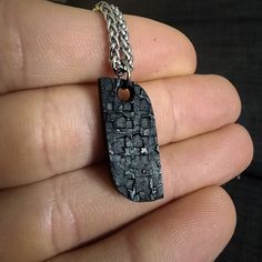 Mens Black Stainless Steel Necklace. The pictured pendant is aproximately 28 mm long by 13 mm wide. Forge, hammer, anvil-- all of my work uses blacksmith techniques and this piece is no different. This pendant is textured on one side and flat on the other. Because I hammer each pendant by hand, each piece comes out a little different. No two are the same, and each one contains little imperfections that set it apart from the others. The black finish is one formed from oxidizing the stainless stee Black Stainless Steel Necklace, Black Hand, Black Stainless Steel, Stainless Steel Necklace, Hand Forged, Necklace Lengths, Necklace Etsy, Mens Jewelry, Jewelry Necklace Pendant