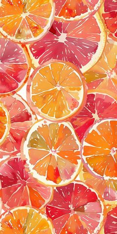 an image of oranges and grapefruits cut in half