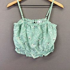 This Cute Floral Cropped Tank Top Is Perfect For Summer! It Is Size Medium And Runs True To Size. It Has Never Been Worn And Still Has Tags. It Is From Hollister. Green Camisole Crop Top For Spring, Cute Cami Top For Spring, Green Crop Top Camisole For Spring, Casual Floral Print Camisole Crop Top, Square Crop Top, Floral Squares, Going Out Tops, Hollister Tops, Cropped Tank Top