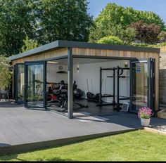 a home gym in the middle of a backyard