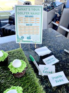 cupcakes with green frosting and golf balls on them are sitting in front of a sign that says what's your golfer name?