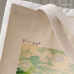 A tote bag depicting Van Gogh's "Green Wheat Field, Auvers".





 <Size>



 Height: 36cm

 Width: 36cm

 Gusset: 10cm






 <Material>



 thick canvas fabric Artistic Large Capacity Canvas Bag, Artistic Canvas Gift Bag, Artistic Rectangular Canvas Bag, Green Wheat Field, Field Of Wheat, Green Wheat, Green Field, Wheat Field, Wheat Fields