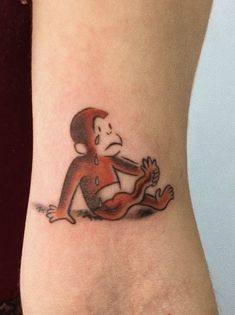 a 2x2” tattoo of children’s character Curious George. He has a broken leg and is weeping. Curious George Tattoo, George Tattoo, First Tattoos, Tattoo Placements, Collage Pics, Journal Collage, Curious George