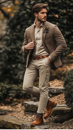 A man in rustic wedding guest attire featuring a semi-formal suit with chic rustic details.