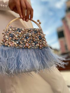 "Colorful and vintage-looking luxurious wedding clutch is handmade and decorated with rhinestones, crystals, pearl beads, and blue ostrich feathers. The small sky blue bridal handbag will be a great addition to your amazing look on the Special Day! The tiny elegant evening bag will be a lovely accessory not only for the bride but also will suit the bridesmaids' outfit, Mom, or Mother-in-law festive look. And after the celebration will over - you can take it with you to the costume party in Great Sac Diy, Bridal Handbags, Bridal Purse, Party Handbags, Bridal Bag, Wedding Purse, Wedding Clutch, Fancy Bags, Evening Handbag