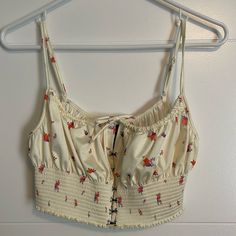 Urban Outfitters Floral Silk Crop Top Tank. Size M. Never Worn. Vacation Sleeveless Tops With Lemon Print, Sleeveless Tops With Lemon Print For Vacation, Urban Outfitters Cotton Tops With Floral Print, Yellow Urban Outfitters Top For Spring, Urban Outfitters Yellow Tops For Spring, Beach Cotton Tops With Lemon Print, Cream Printed Tops For Summer, Yellow Urban Outfitters Top For Vacation, Silk Crop Top