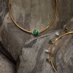 Description Inspired by the beautifully patterned Malachite gemstone, the earliest ore of copper, Tamra is eccentric, contemporary, and distinctively classy. Handcrafted on 925 hallmark silver and gold finish. This collection is curated for everyday luxury. This hasli necklace features a round-cut malachite charm in the center highlighted with CZ stones. A striking yet simple necklace to style with Paksha's unmatched delicate jewelry. Product Information Materials used: 925 Silver with 1.0-micro Fusion Style Gold And Emerald Jewelry, Luxury Brass Gemstone Jewelry, Gold Necklace With Gemstone Accents For Festive Occasions, Gold Necklaces With Gemstone Accents For Festive Occasions, Luxury Brass Gemstone Necklaces, Modern Gold Necklaces With Gemstone Accents, Gold Emerald Jewelry With Gemstone Accents, Temple Jewelry With Natural Stones For Gift, Elegant Festive Jewelry With Natural Stones