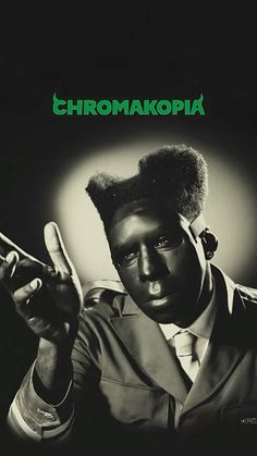 a black and white photo of a man in uniform pointing at something with the words chromakopia on it