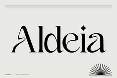 the word aldeia written in black ink on a white background with an ornate sunburst