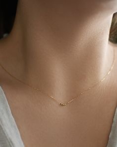 "𝗘𝗮𝘀𝘆 𝗧𝗼 𝗦𝘁𝘆𝗹𝗲, 𝗠𝗮𝗱𝗲 𝗧𝗼 𝗟𝗮𝘀𝘁 Our dainty solid gold chain necklaces are easy to layer and ready to be worn on repeat! Created to last a lifetime, these necklaces will remain evergreen even as the years and trends come and go. 𝗠𝗮𝘁𝗲𝗿𝗶𝗮𝗹𝘀 𝗪𝗲 𝗨𝘀𝗲 This necklace is made entirely with sturdy 14k yellow gold pieces. The bead accents measure 3mm each! 𝗟𝗲𝗻𝗴𝘁𝗵 𝗢𝗽𝘁𝗶𝗼𝗻𝘀 We have lengths between 14\" - 20\" available! Generally, we recommend 14\" length for childr Cheap Yellow Gold Jewelry With Delicate Chain, Cheap Minimalist Yellow Gold Chain Necklace, Cheap Simple Yellow Gold Jewelry, Light Wait Neckless Gold, Everyday 14k Gold-filled Necklaces With Tiny Beads, Everyday 14k Gold-filled Necklace With Tiny Beads, Everyday 14k Gold Filled Tiny Beads Necklace, Everyday 14k Gold Filled Necklace With Tiny Beads, Elegant Everyday Necklaces With Tiny Beads