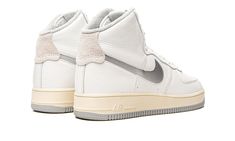 The Women’s Nike Air Force 1 High Sculpt “White/Silver” is a women’s version of the vintage basketball and lifestyle shoe in a timeless colorway.  Loosely inspired by the silhouette’s original shape and design, sans its adjustable ankle strap, the Air Force 1 High Sculpt features a white leather upper with a Metallic Silver cut-out Swoosh on either side.  A light grey hairy suede panel is found on the heel.  The tongue tag is devoid of any “Air Force 1” branding, giving the shoe a sleek, modern Womens Air Force 1, Nike Air Force 1 High, Air Force 1 High, Stadium Goods, Nike Womens, Silver Shoes, Vintage Aesthetic, Nike Air Force 1, Wedge Sneaker