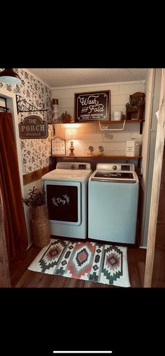 a small kitchen with an oven, stove and rug on the floor in front of it