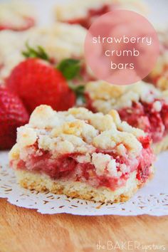 strawberry crumb bars are stacked on top of each other