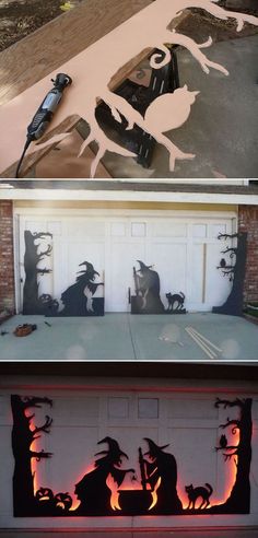 halloween decorations are on display in front of a garage door with cats and bats painted on it