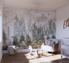 a baby's room with a large mural on the wall