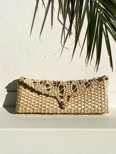 Absolutely Gorgeous clutch handmade 100% of Palm Leaves.  Lightweight and comfortable handwoven straw clutch bag. It features a beautiful natural straw color and it has a front loop for closure.  This is a great bohemian clutch bag, perfect for a beach party or wedding and a great addition for your next vacation wardrobe. It Also makes a stylish gift. Color: Natural Measurements: Length: 12"/30,5 cm Width: 1.5"/4 cm Height:5"/12,7 cm  Made in Brazil Handmade by local craftsman in the countryside Natural Woven Clutch For Everyday Use, Natural Woven Straw Clutch, Natural Clutch With Braided Handles For Summer, Beige Woven Straw Clutch, Natural Clutch With Braided Handles For Vacation, Handwoven Natural Clutch For Everyday Use, Eco-friendly Woven Pouch Clutch, Eco-friendly Woven Rectangular Clutch, Eco-friendly Rectangular Woven Clutch