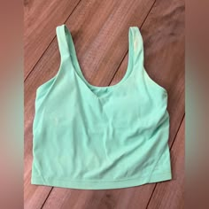 This Tank Has Been Worn But Only A Few Times!!! Looks Brand New And Has No Stains Rips Or Anything!!! Super Cute Color And Cute Tank In General, It Does Have A Built In Bra So No Need To Wear A Bra!!! Summer Workout Tops With Built-in Bra, Seamless Summer Yoga Top, Summer Workout Tops With Seamless Design, Green Top With Built-in Bra For Vacation, Summer Sports Tops With Built-in Bra, Seamless Green Top For Vacation, Seamless Green Tops For Vacation, Preppy Tank Tops, Lululemon Fits